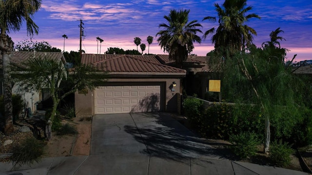 view of front of home with a garage