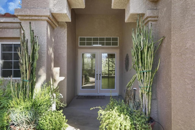 doorway to property featuring french doors