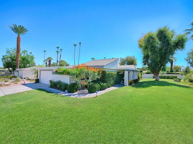 view of yard with a garage