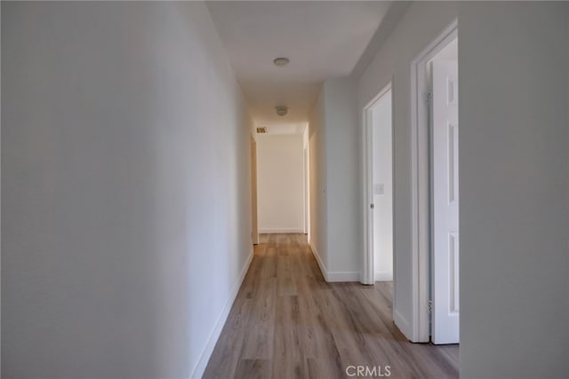 hallway featuring light hardwood / wood-style floors