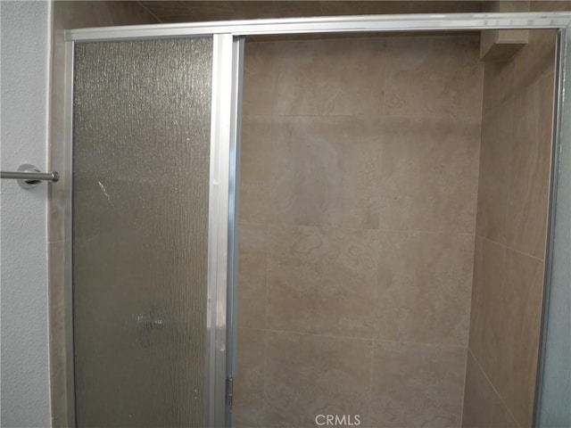 bathroom featuring walk in shower