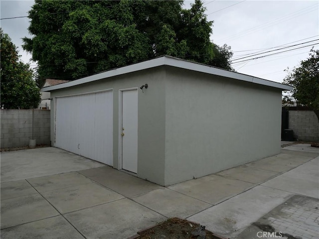 view of outbuilding with a garage