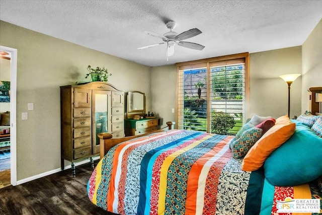 bedroom featuring a textured ceiling, ceiling fan, access to exterior, and dark wood-type flooring