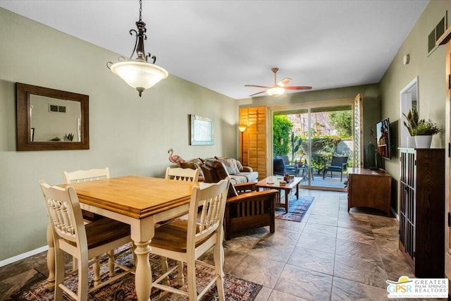 dining room with ceiling fan