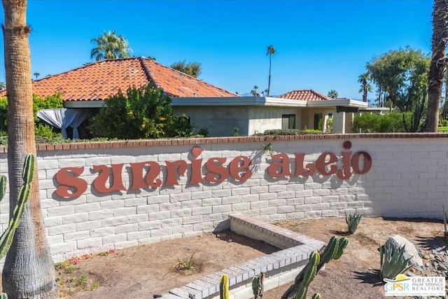 view of community sign