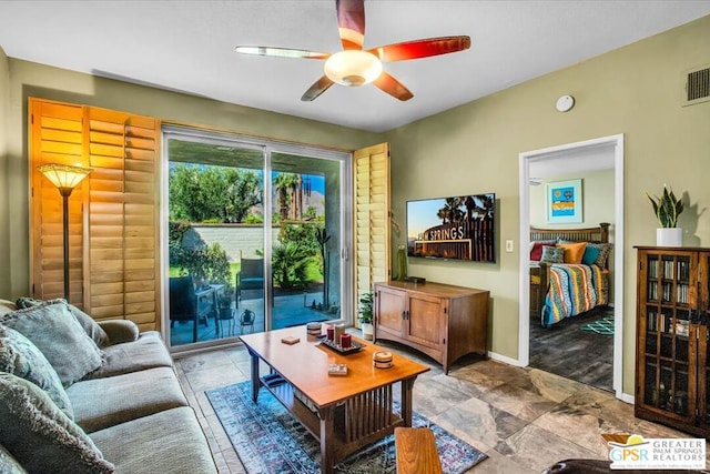 living room with ceiling fan