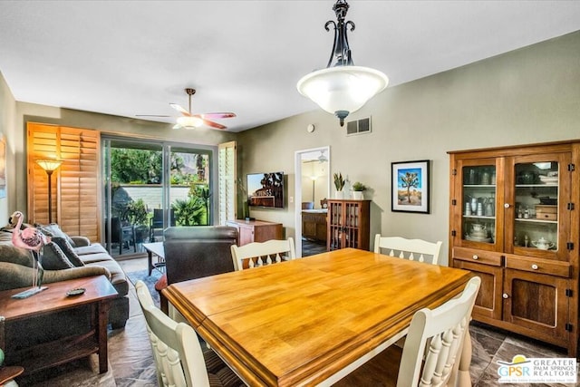 dining room with ceiling fan