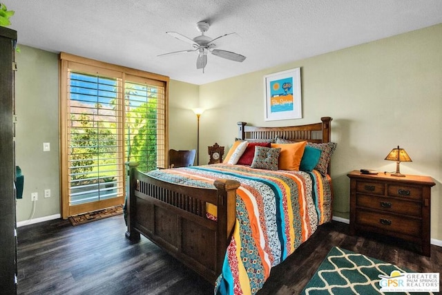 bedroom featuring a textured ceiling, dark hardwood / wood-style flooring, and ceiling fan