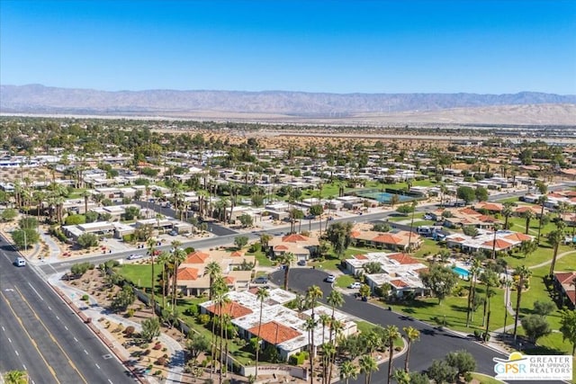 drone / aerial view featuring a mountain view