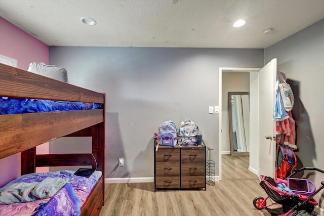 bedroom featuring light hardwood / wood-style floors