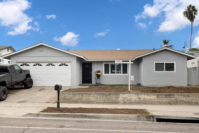 single story home with a garage