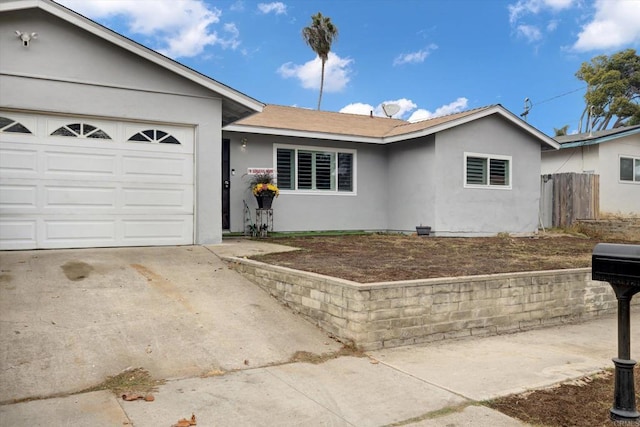 single story home with a garage