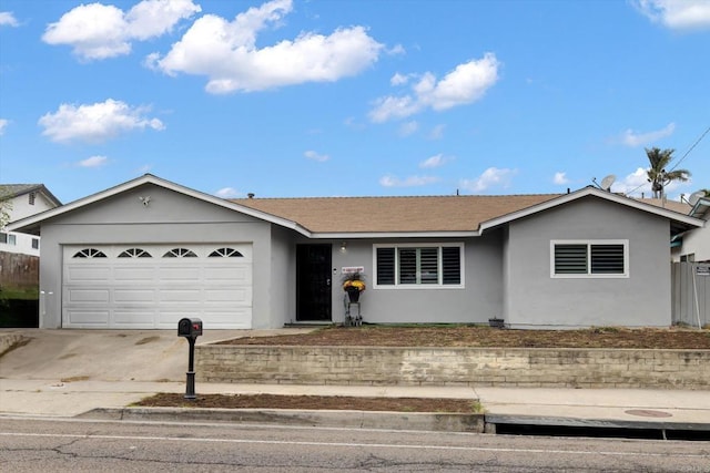 ranch-style home with a garage