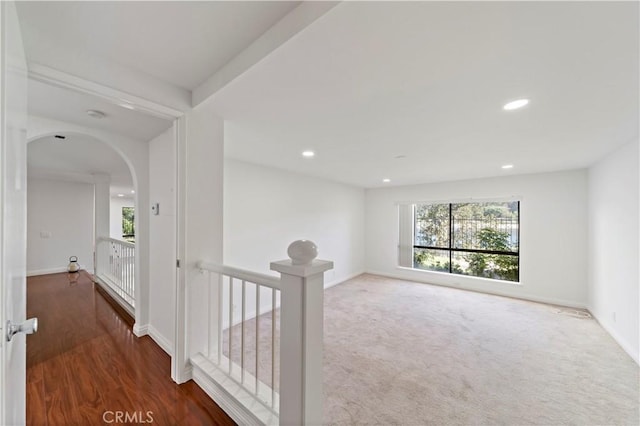 hallway featuring dark hardwood / wood-style floors