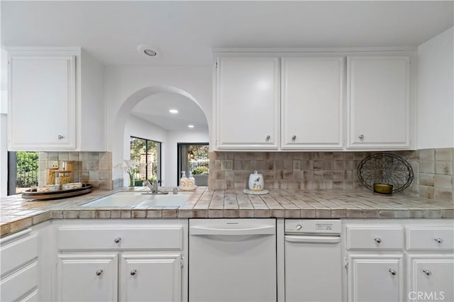 kitchen featuring white cabinets