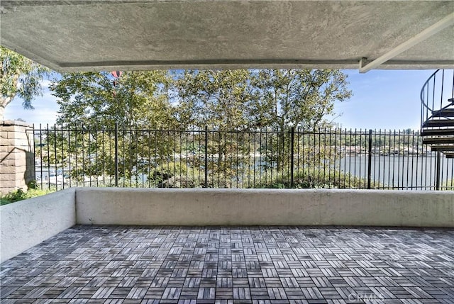 view of patio / terrace featuring a water view