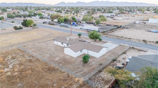 drone / aerial view featuring a mountain view