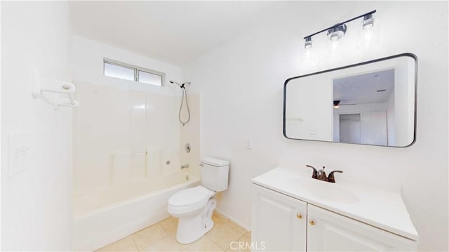 full bathroom featuring toilet, vanity, ceiling fan, tile patterned floors, and bathing tub / shower combination