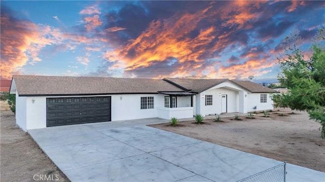 ranch-style home with a garage