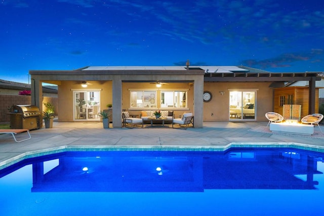 view of pool with ceiling fan, a grill, an outdoor hangout area, and a patio