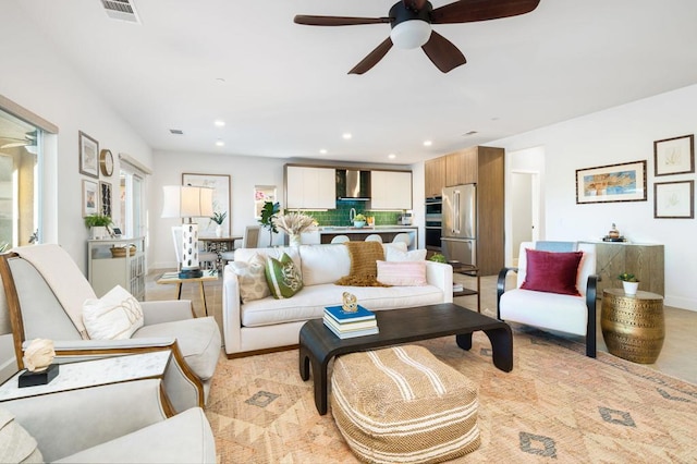 living room featuring ceiling fan