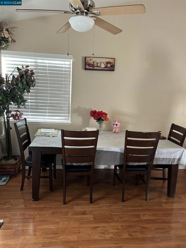 dining area featuring ceiling fan and hardwood / wood-style floors