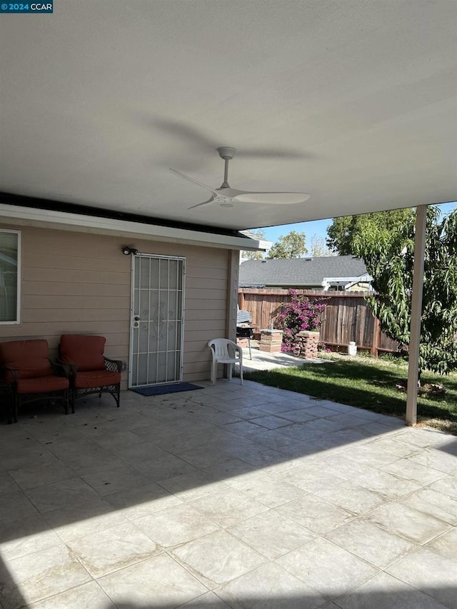 view of patio with ceiling fan