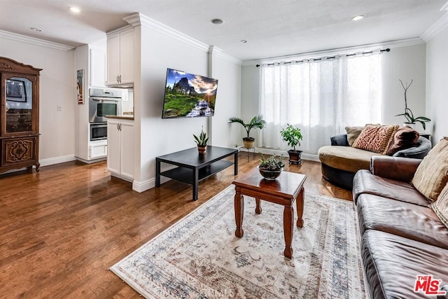 living room featuring wood-type flooring and ornamental molding