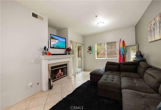 living room with light tile patterned floors