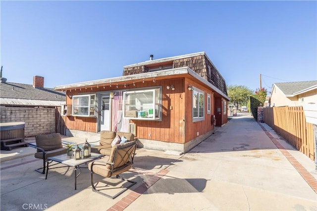 rear view of house featuring a patio area