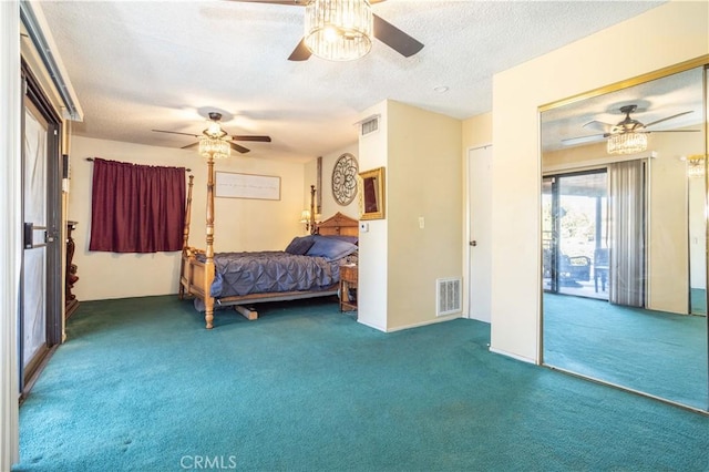 carpeted bedroom featuring access to exterior, a textured ceiling, and ceiling fan