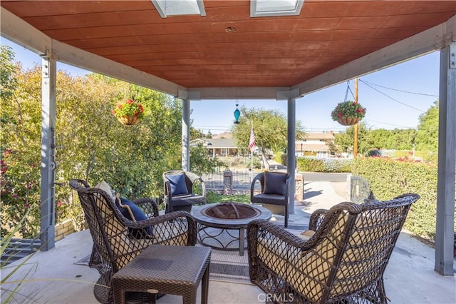 view of patio / terrace featuring a fire pit