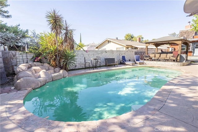 view of pool with a gazebo and a patio