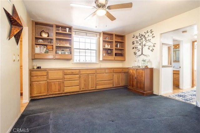 bar featuring dark carpet and ceiling fan