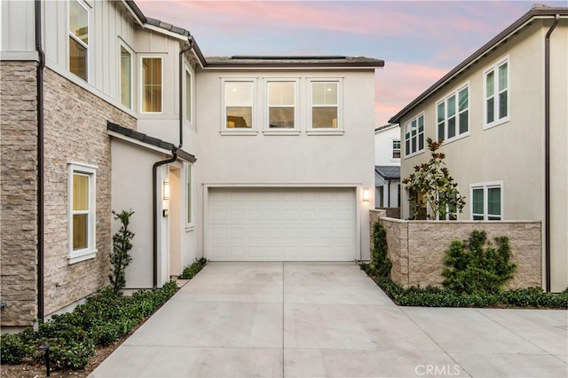 view of front of home with a garage