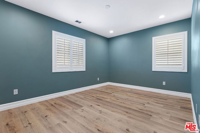 empty room featuring light hardwood / wood-style floors