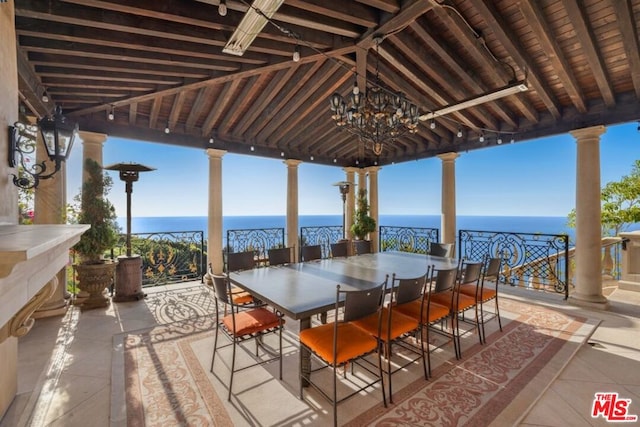 view of patio / terrace with a water view