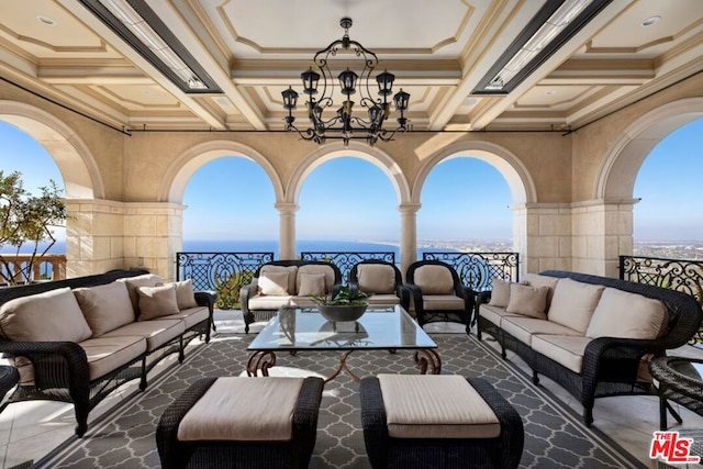 view of patio featuring outdoor lounge area and a water view