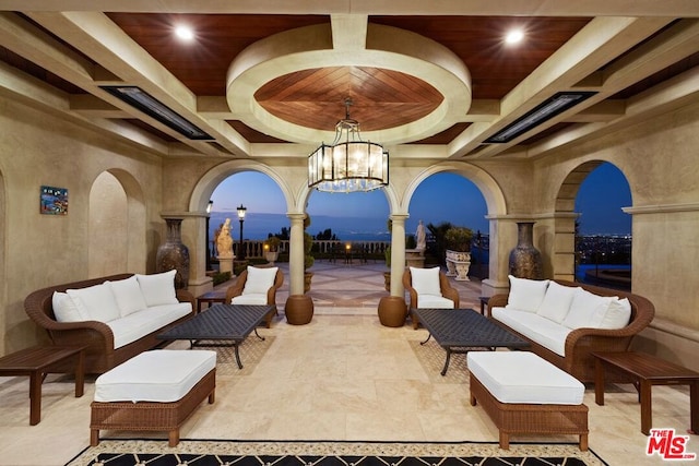 patio terrace at dusk with an outdoor hangout area