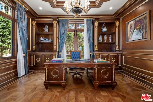 home office with parquet floors, crown molding, and an inviting chandelier