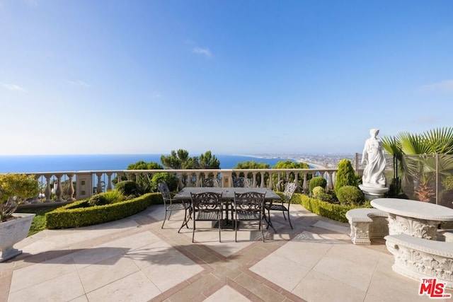 view of patio / terrace featuring a water view