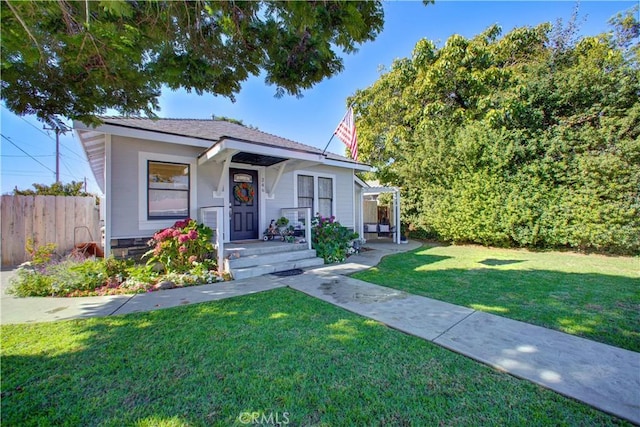 bungalow with a front lawn