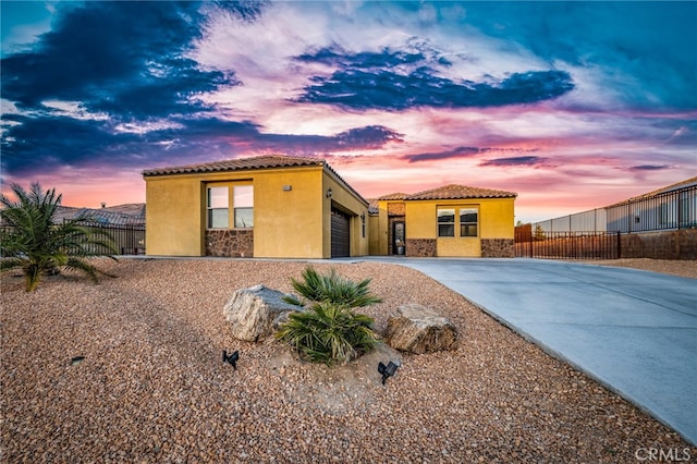 view of front of home featuring a garage