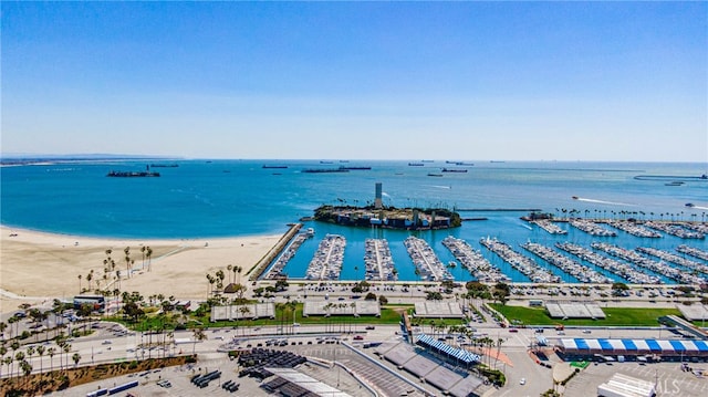 aerial view featuring a view of the beach and a water view