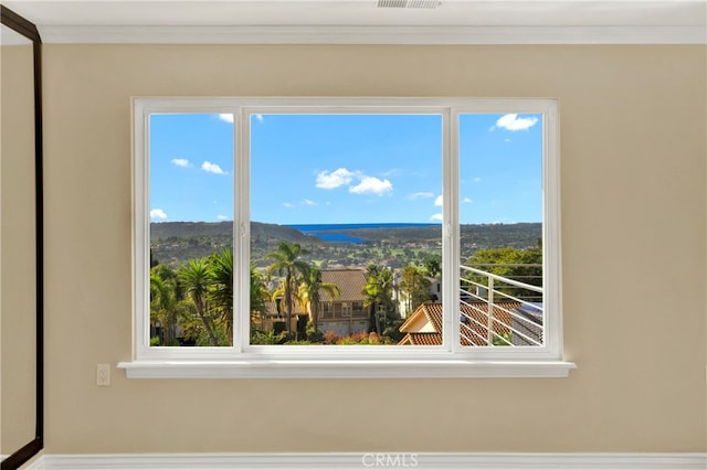 interior space with crown molding