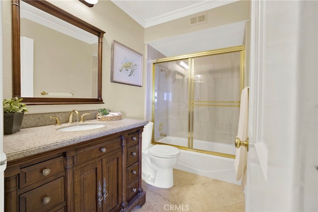 bathroom with toilet, vanity, visible vents, ornamental molding, and tile patterned floors