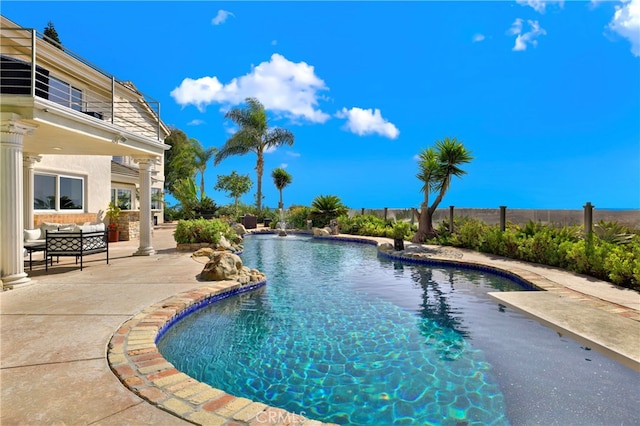 view of swimming pool with an outdoor hangout area, a fenced in pool, and a patio