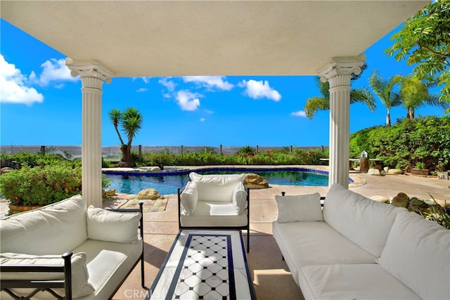 view of patio / terrace with outdoor lounge area and an outdoor pool