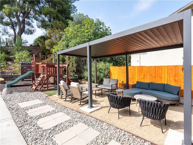 view of patio / terrace with a playground and an outdoor living space