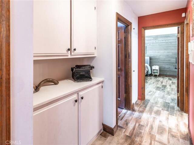 hallway featuring light hardwood / wood-style flooring